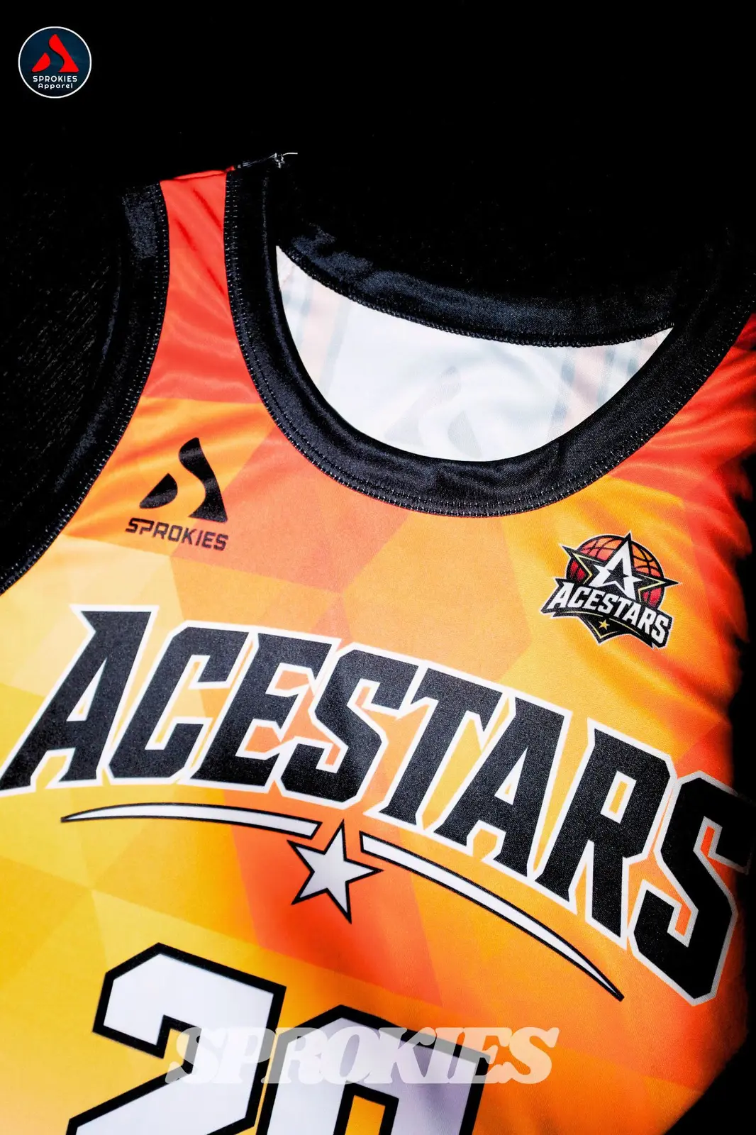 Finished orange custom basketball jersey by Sprokies Apparel
