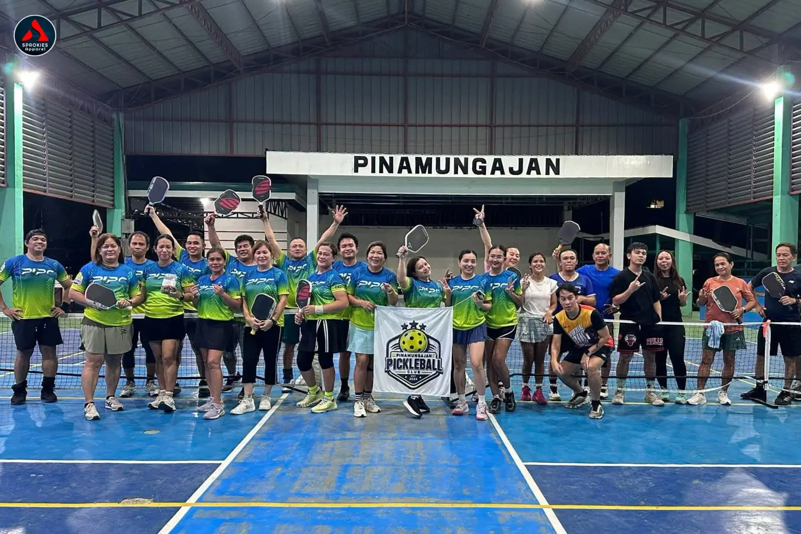 Pinamungajan community basketball group gathered on the court